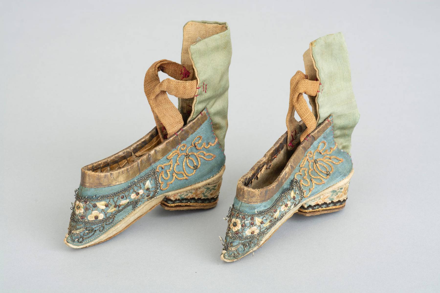 unBinding Bodies. Lotus Shoes and Corset